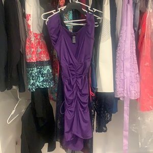 Mid-length, form fitting dress. New, no tags.